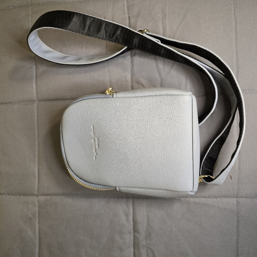 Sky blue inicat crossbody bag with gold zippers NWOT